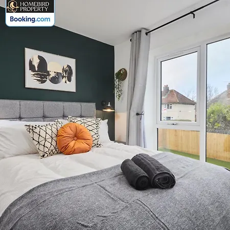 Spacious 4bdr House By Homebird Management Short Lets & Serviced With Private Parking & Garden *